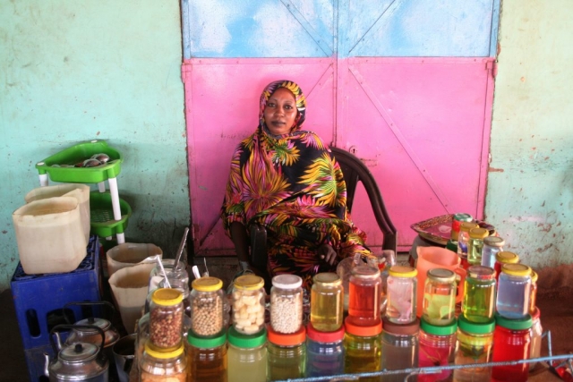 Woman shopkeeper in Sudan.