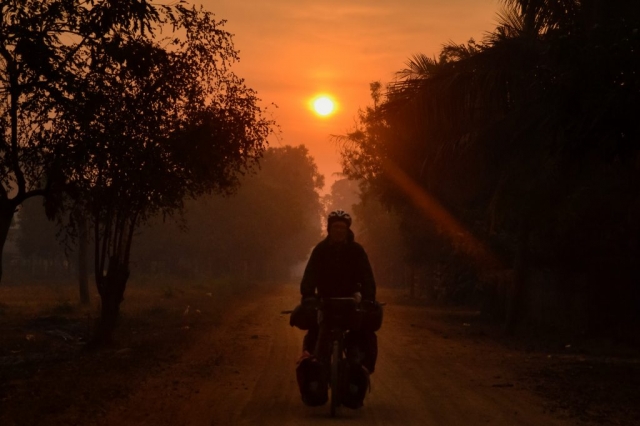 cyclist in sunrise